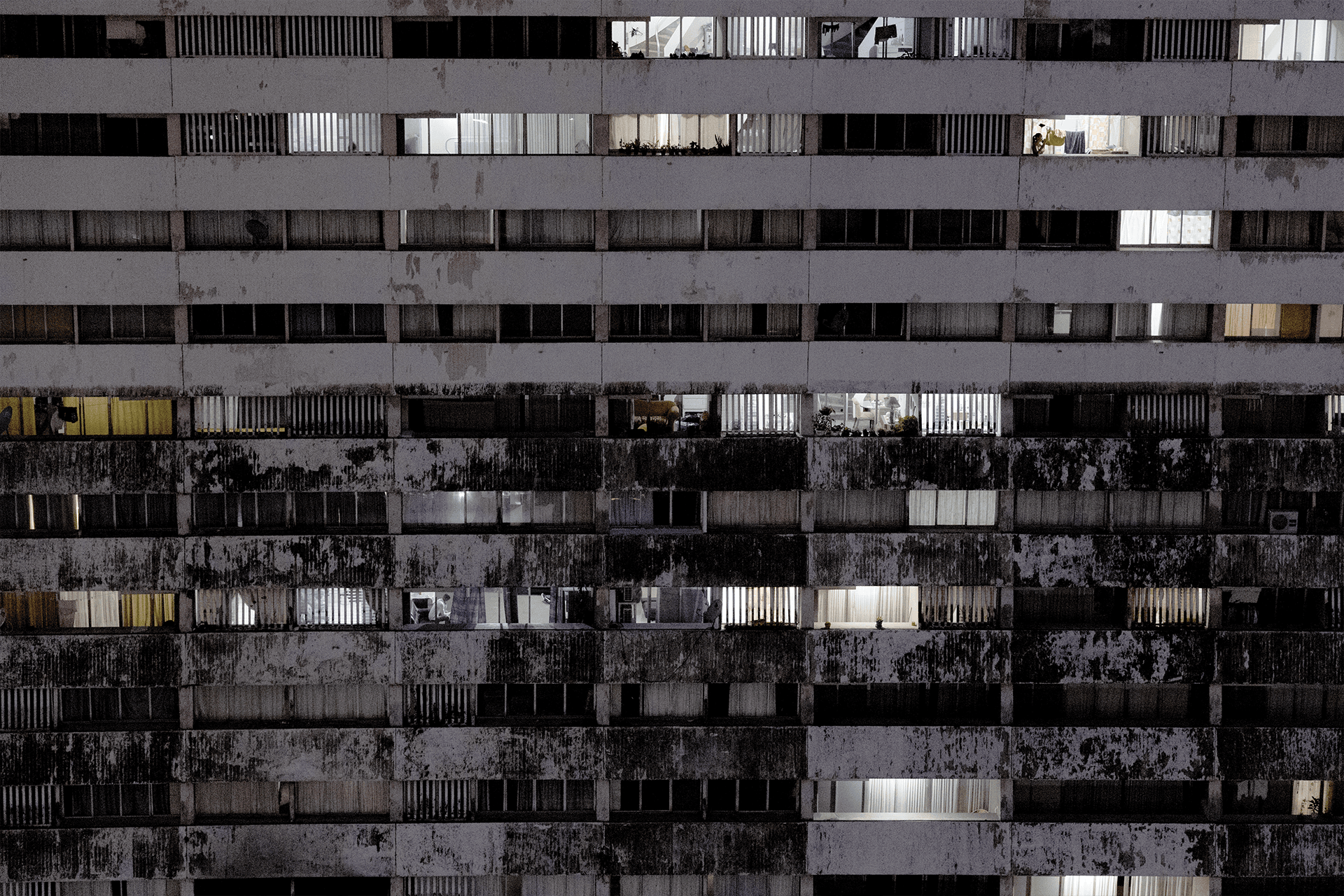 Windows from a building in Parque Central, a famous middle-class complex built in the 70’s that was once considered the most important urban development in Latin America.