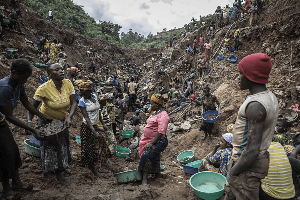 Miners at a gold mine carved into a diverted riverbank in Iga Barriere in the Democratic Republic of the Congo's Ituri province. - Finbarr O'Reilly 