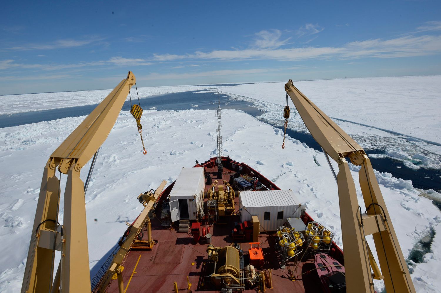 Hudson Bay, Canada, June 2018. The Amundsen, Canadian ice breaking Arctic research vessel, moves through thick sea ice. Apart of its coast guard duties, the ship tours the Canadian Arctic every year with an international group of ice specialists, biologists, oceanographers working in its on-board 22 laboratories.
